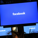 A Facebook logo is pictured on a screen in London on Oct. 10, 2016.
JUSTIN TALLIS/AFP/Getty Images